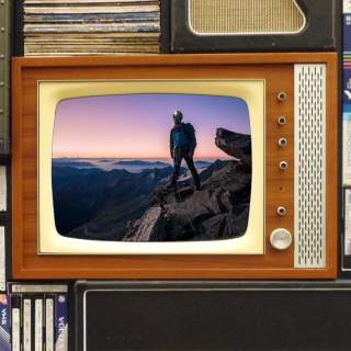 Alter Fernseher mit Bergsteigerbild