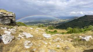 Regenbogen über Landschaft